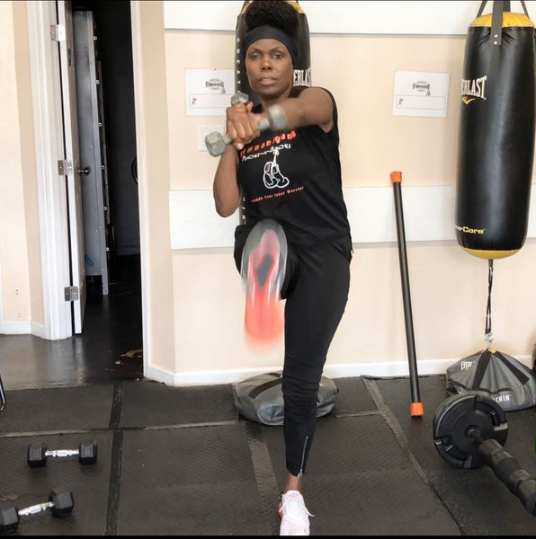 Enhance Your Core Strength: Dumbbell Leg Raise and Cross Punch